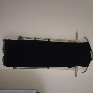 Black mid dress. Turtle neck, sleeveless.